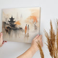 Framed canvas print of Oriental pagoda and autumn reflection with silhouetted figures in mist