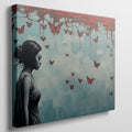 Framed canvas print of a female silhouette with red butterflies against an urban backdrop