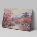 Framed canvas print of a traditional Asian cherry blossom landscape with pagodas and a serene river