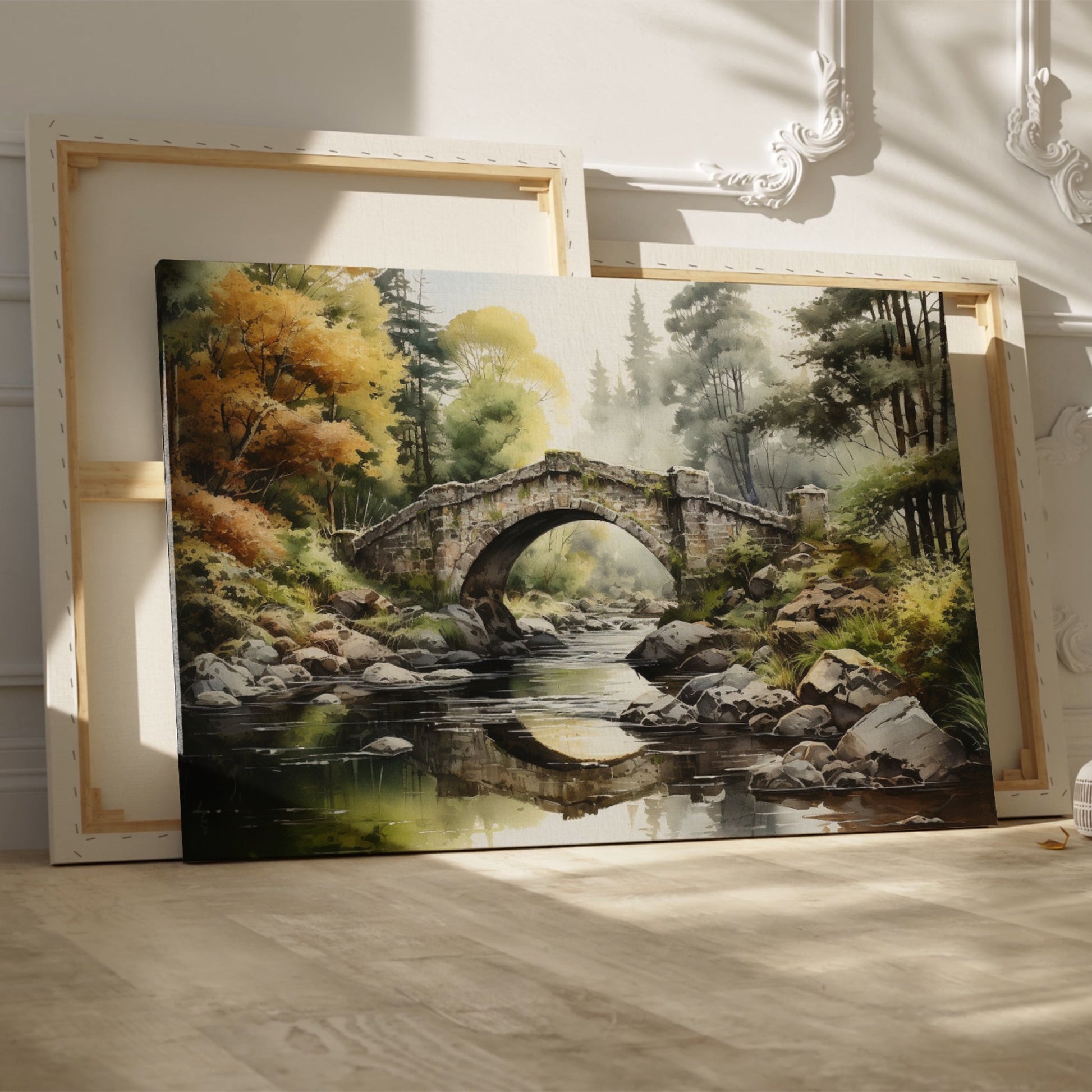 Framed canvas print of a tranquil autumnal scene featuring a rustic stone bridge over a serene river with lush forest in the background