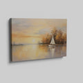 Framed canvas print of a sailboat during sunset with golden sky and water reflections