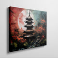 Framed canvas print of an oriental pagoda in crimson and teal colours with moonlit scenery