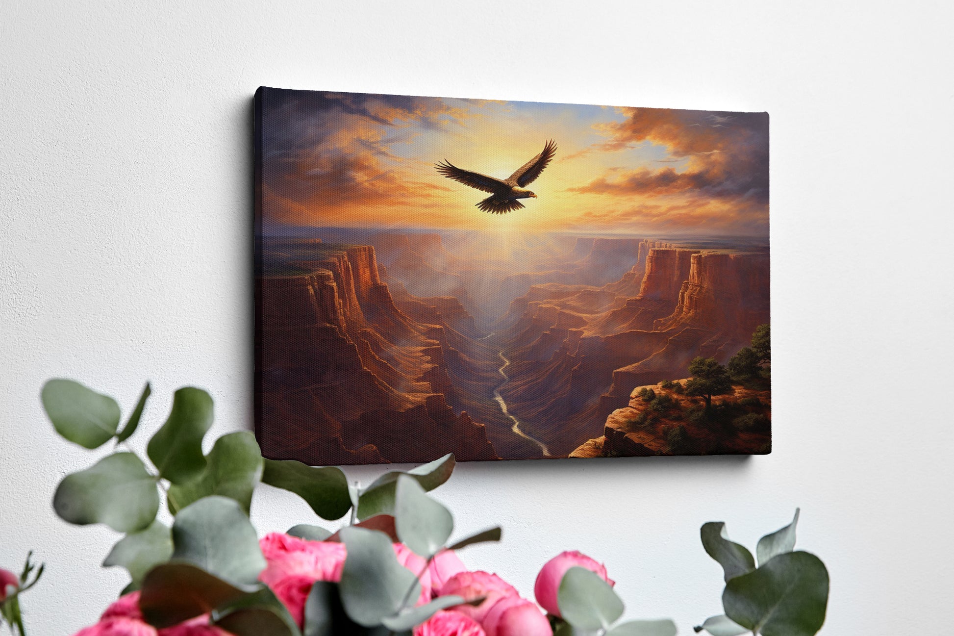 Framed canvas print of a majestic eagle flying over a grand canyon at sunrise with radiant warm colours