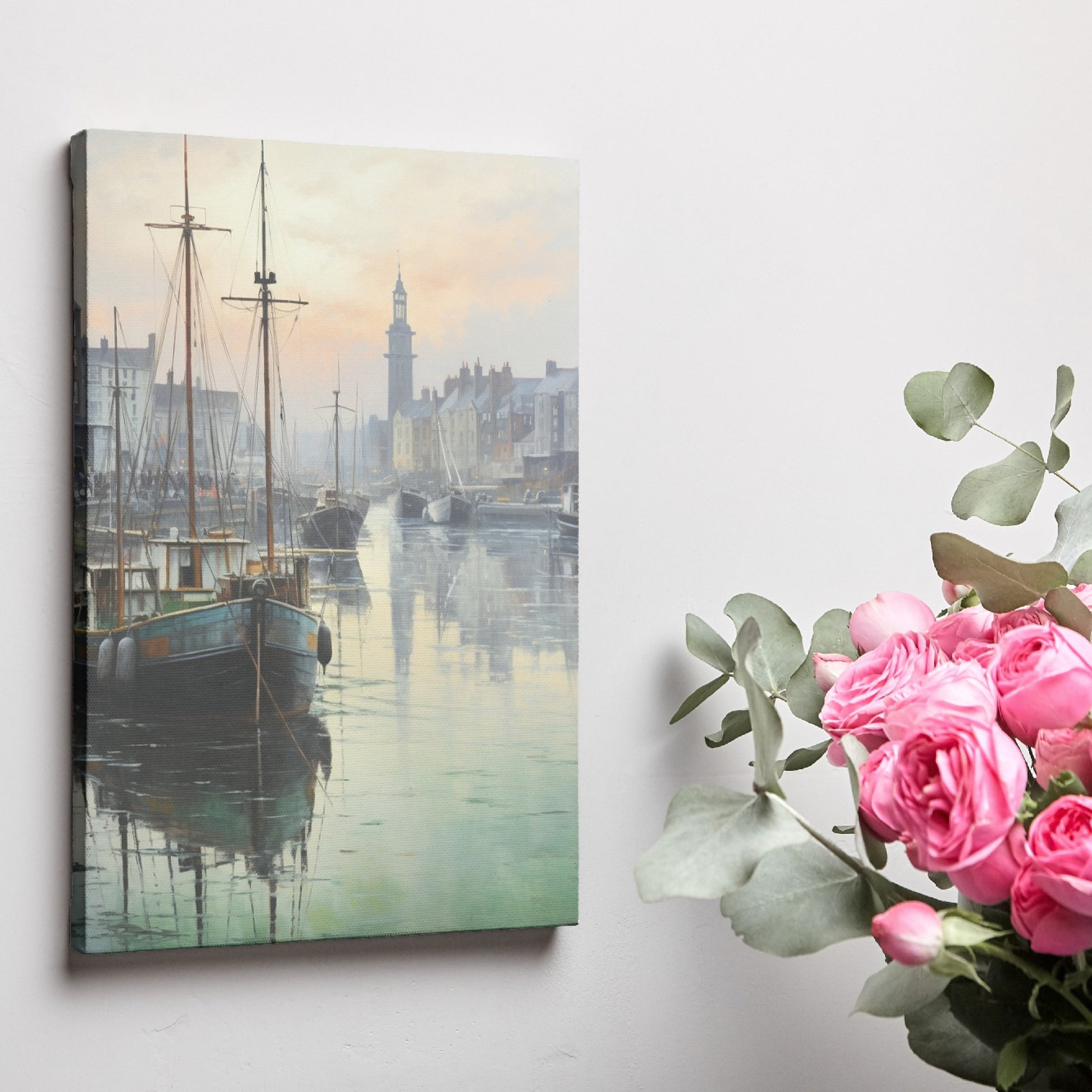 Framed canvas print of a serene harbour scene with sailing boats and a historic lighthouse at dawn