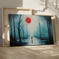 Framed canvas print of a mysterious blue forest with a vibrant red moon and a lone silhouette reflected on the water