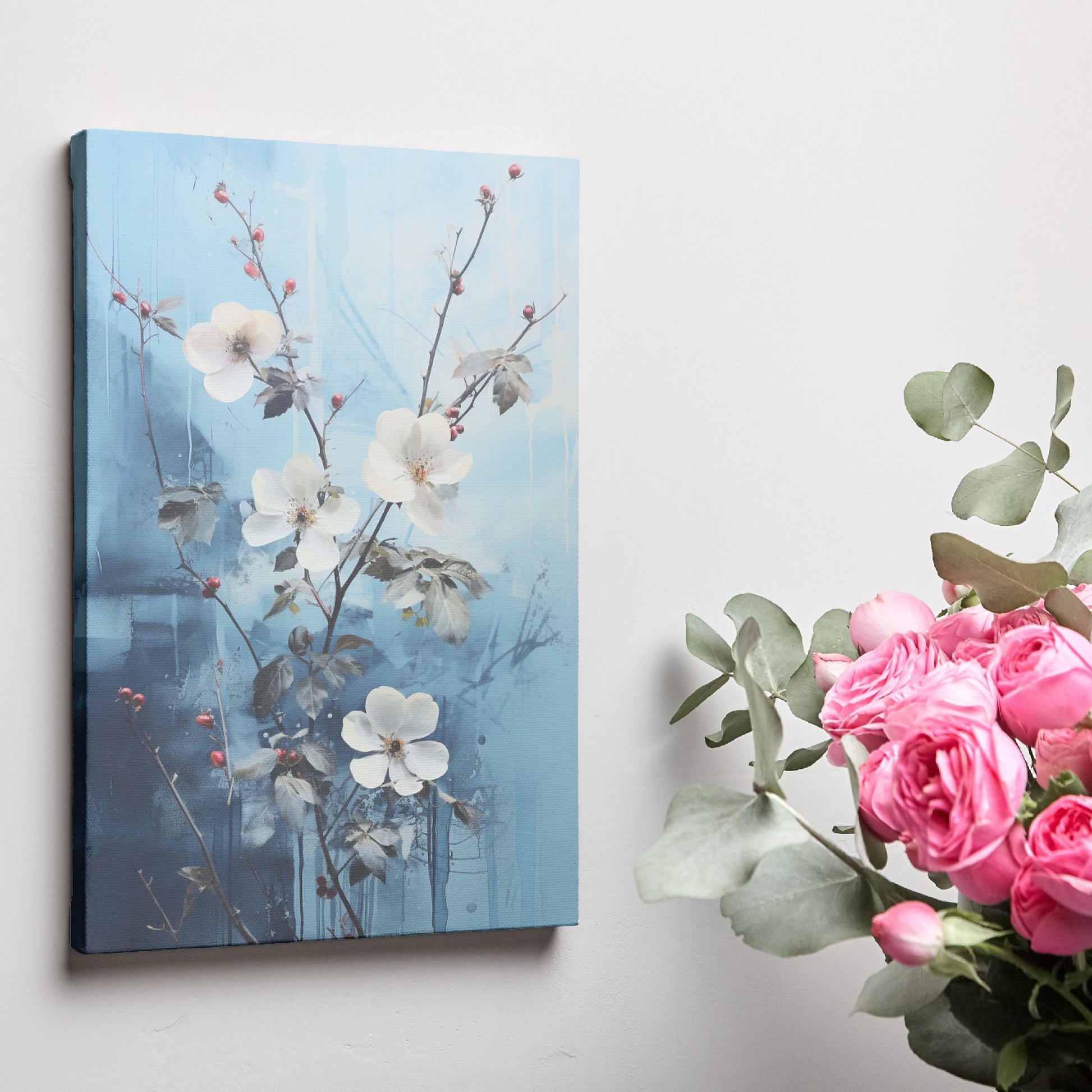 Framed canvas print of ethereal white blossoms with red berries against a textured blue abstract background