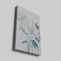 Framed canvas print of modern white floral art with soft green and pastel tones