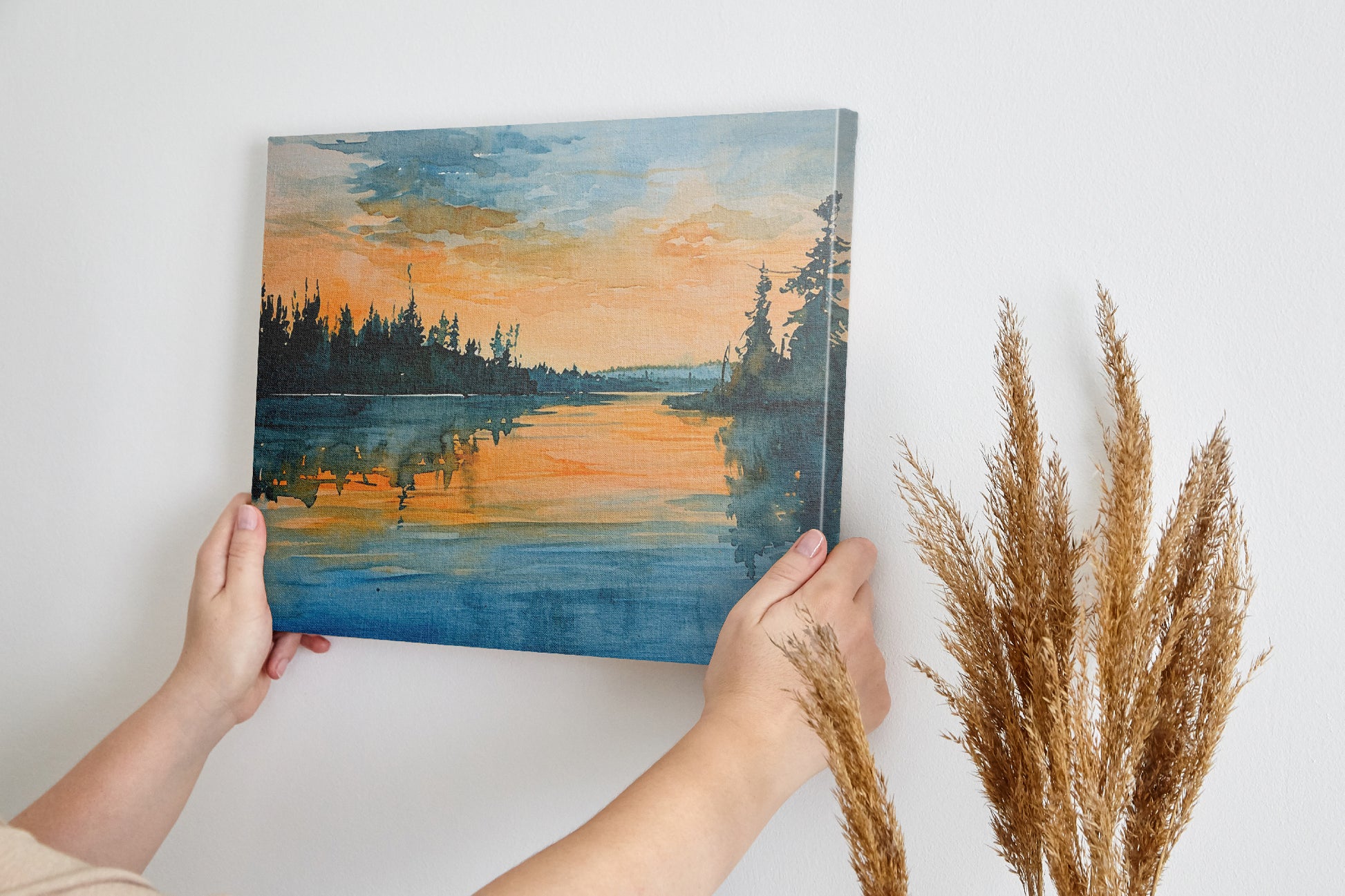 Framed canvas print of a tranquil watercolour landscape with serene reflection and warm sunset tones