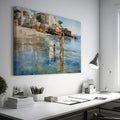 Framed canvas print of a sunlit Mediterranean beach with a mother and child