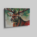 Framed canvas print of an expressive stag portrait with vibrant reds and abstract green background