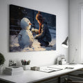 Framed canvas print of a child building a snowman on a snowy city evening