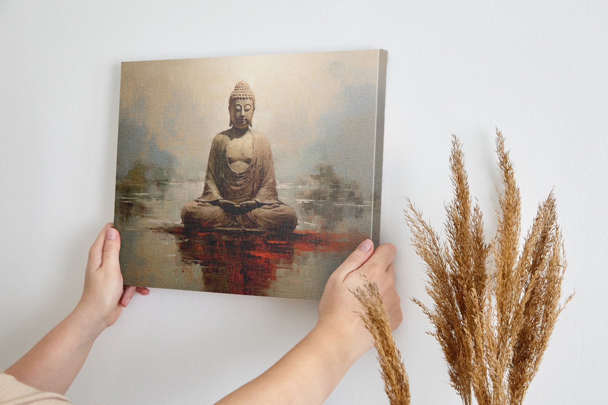 Framed canvas print of a meditative Buddha statue in warm earthy tones