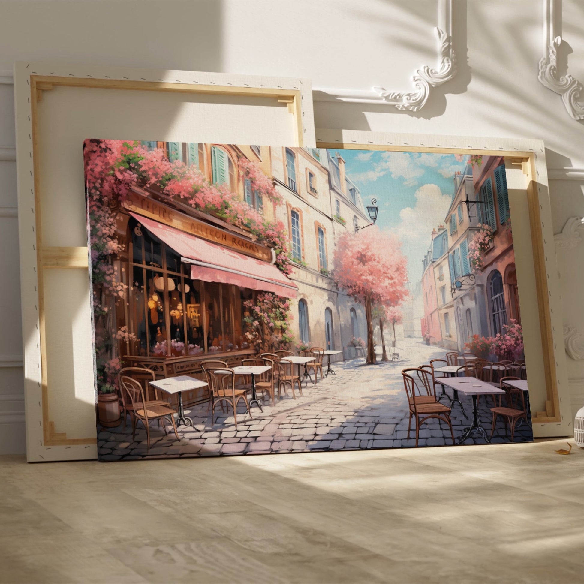 Framed canvas print of a picturesque Parisian alley with cherry blossoms and a street cafe scene in springtime