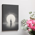 Framed canvas print of a sailboat silhouette against a full moon and starry sky