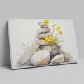 Framed canvas print of Zen stones balanced in watercolour with yellow flowers