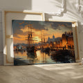 Framed canvas print of a historical port with sailing ships at sunset, featuring warm golden hues and reflective water