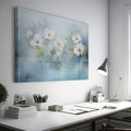 Framed canvas print of serene watercolor flowers with soft blue hues and water reflections