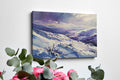 Framed canvas print of a snowy mountain landscape in watercolour with shades of purple and blue