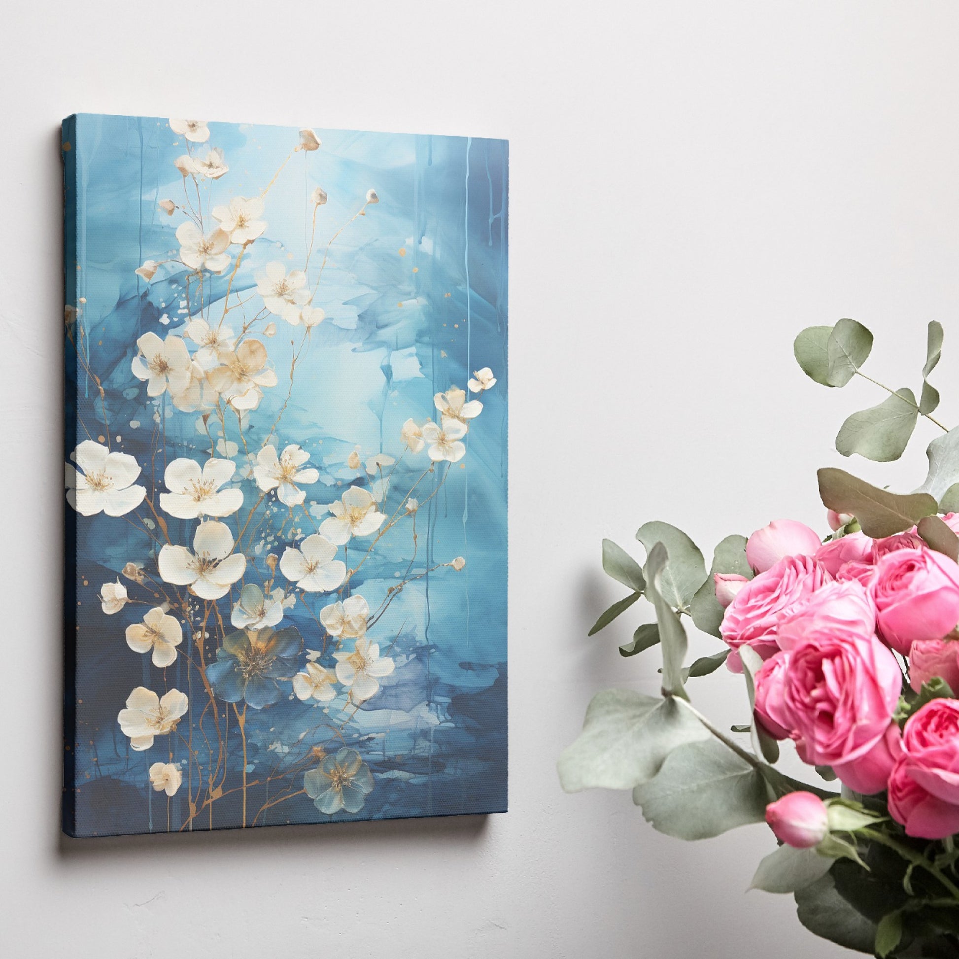 Framed canvas print of abstract blue and gold blossoms over a textured background