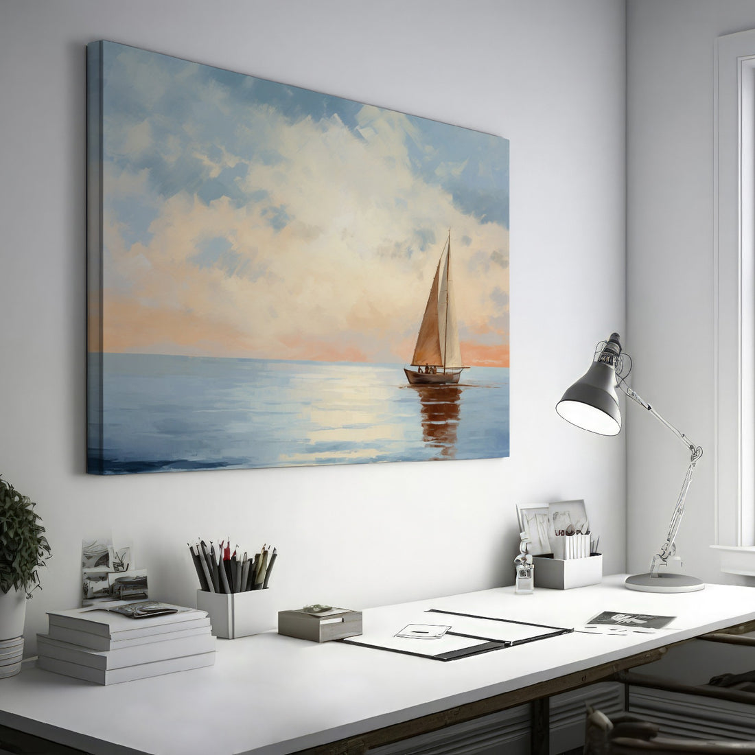 Framed canvas print of a sailboat sailing at sunset with an ethereal sky