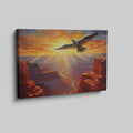 Framed canvas print of a majestic eagle soaring over a stunning canyon at sunset with radiant orange and red hues