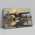 Framed canvas print of vintage airplane with warm sunset reflection on airfield