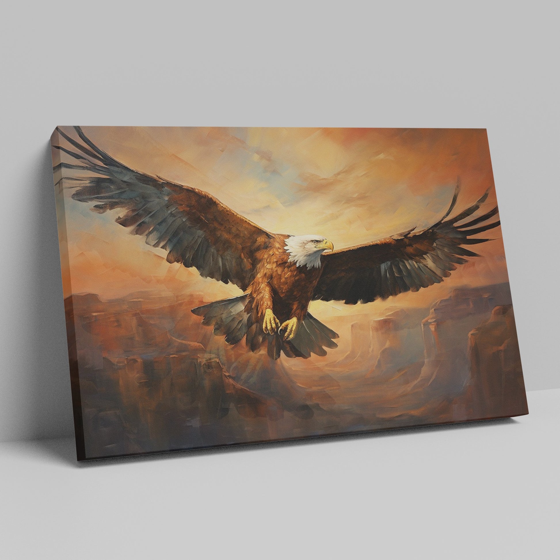 Framed canvas print of a majestic eagle flying over a canyon at sunset with warm golden and orange tones