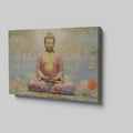 Framed canvas print of a serene Buddha in meditative pose with lotus flowers and reflective water