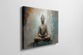 Framed canvas print of a meditative Buddha statue with abstract background in warm and neutral tones