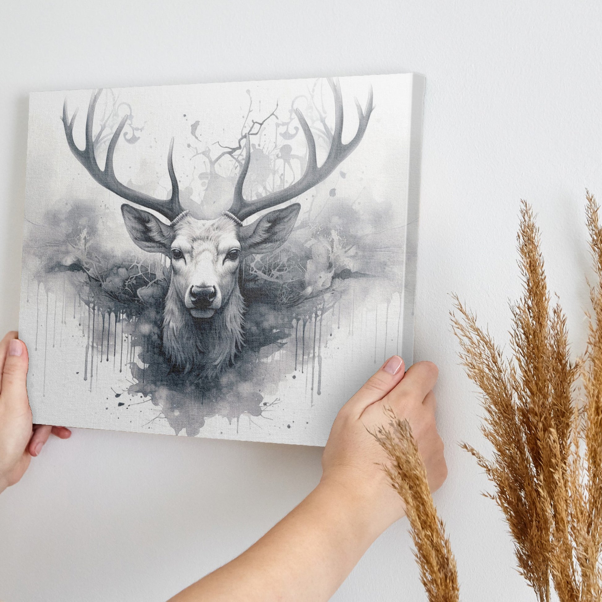 Framed canvas print of a mystical monochrome stag with abstract ink splash design