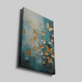 Framed canvas print of abstract painting with butterflies and flowers in gold on a teal background