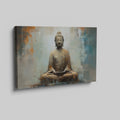 Framed canvas print of a meditative Buddha statue with abstract background in warm and neutral tones