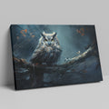 Framed canvas print of a mystical owl with amber eyes perched on a branch against a dark, moody background with autumn leaves