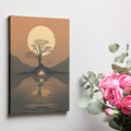 Framed canvas print of African sunset with large sun, tree silhouette, and candle reflection