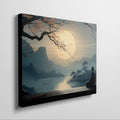 Framed canvas print of a serene Oriental landscape with a meditative figure under a tree against a sunrise backdrop