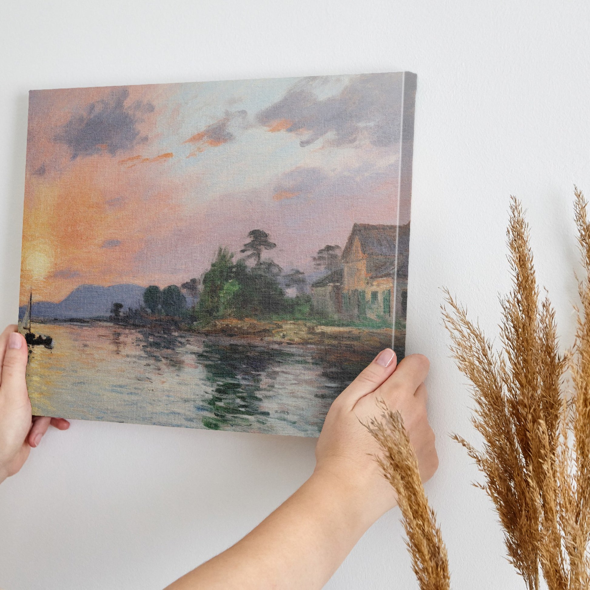 Framed canvas print of an impressionist seascape with sunset and sailing boat