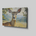 Framed canvas print of a realistic deer in a serene countryside setting with lush foliage