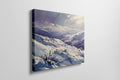 Framed canvas print of a snowy mountain landscape in watercolour with shades of purple and blue