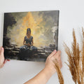 Framed canvas print of a meditative woman at an ancient temple with warm golden hues