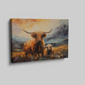 Framed canvas print featuring vibrant Highland cattle with mountain landscape