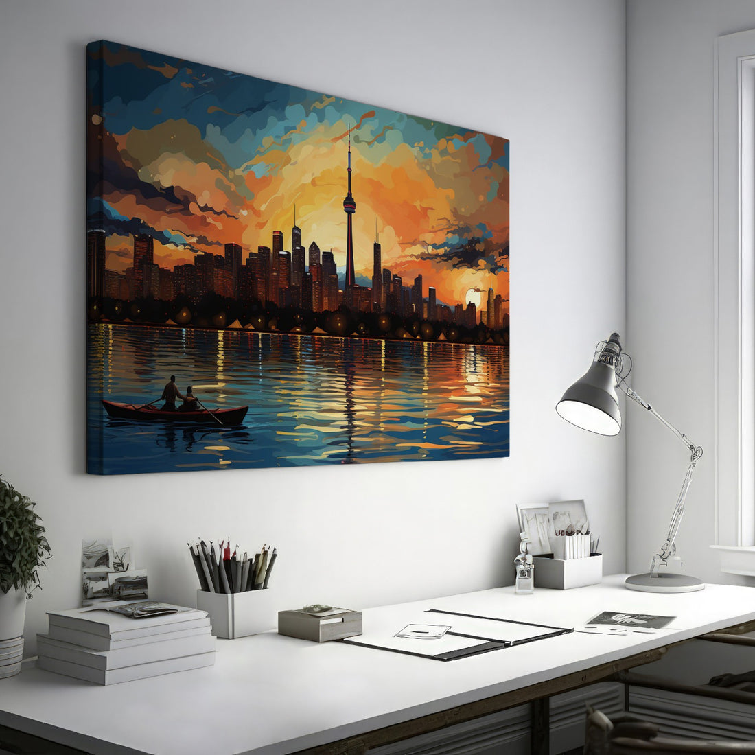 Framed canvas print of a colourful city skyline at sunset with reflections on the water and a rowboat