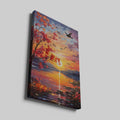 Framed canvas print of an impressionist-style autumn sunset by a lake with birds in flight and vibrant foliage.