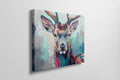 Framed canvas print of a colourful abstract stag with vivid brushstrokes