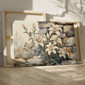 Framed canvas print of elegant white lilies with orange flowers against a rustic stone background, in watercolour style