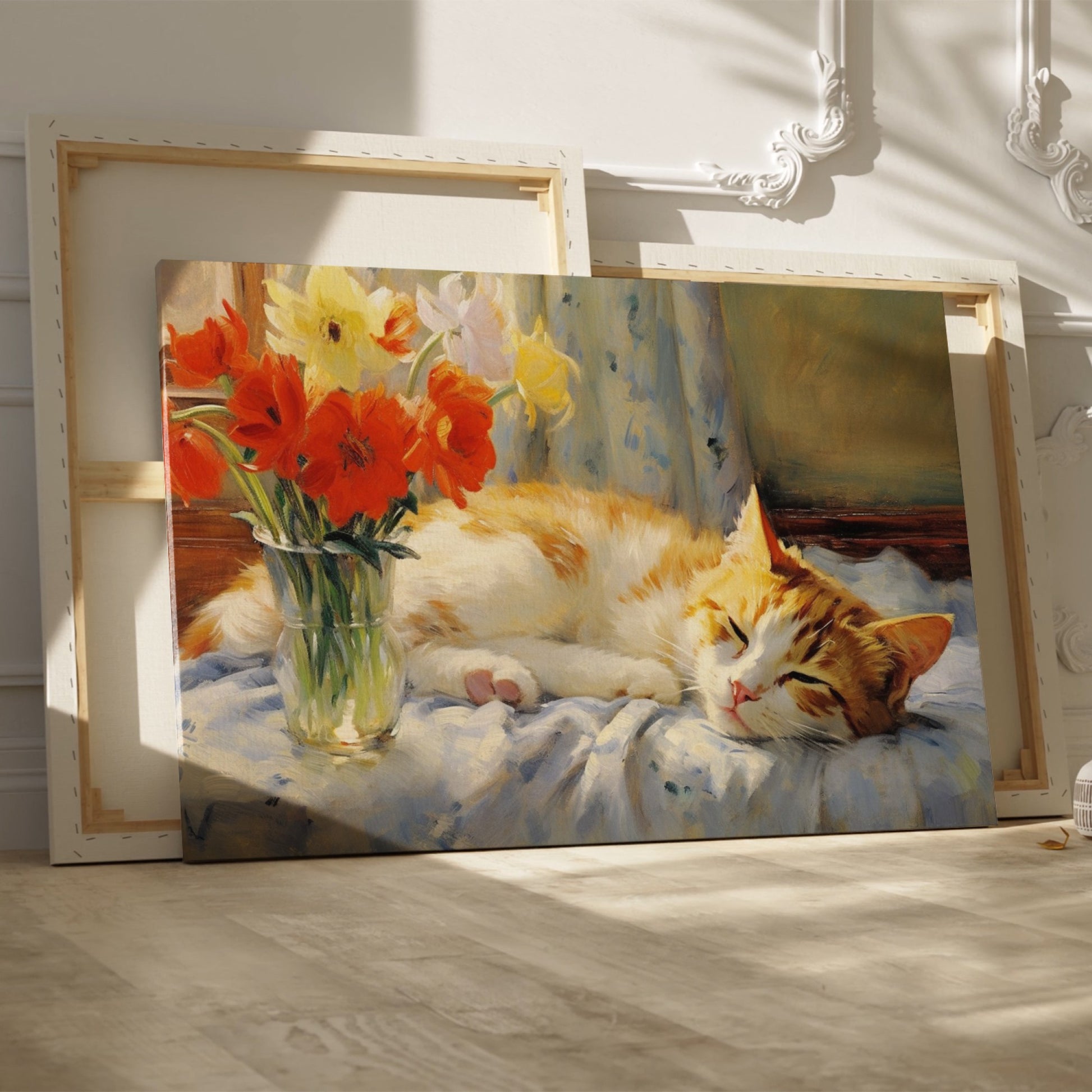 Framed canvas print of a ginger cat sleeping beside vibrant red tulips and yellow daffodils