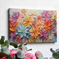 Framed canvas print of vibrant impasto flowers with 3D texture in bright colors