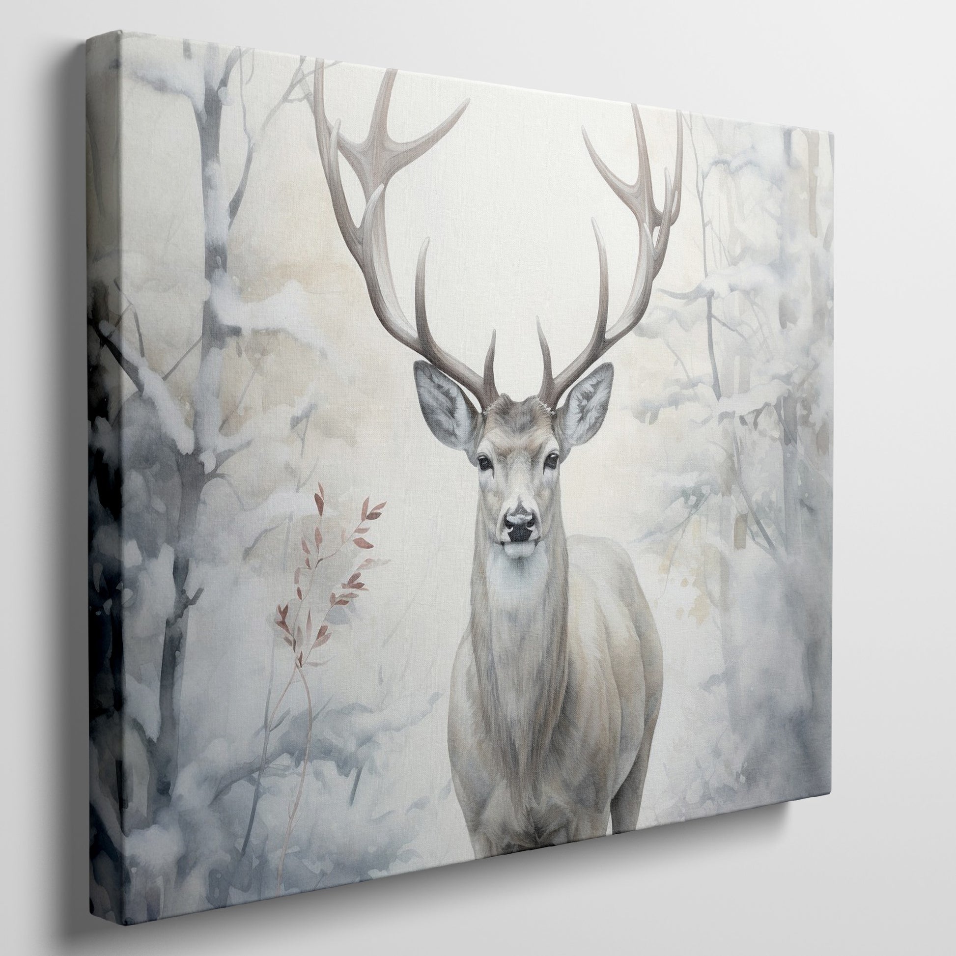 Framed canvas print of a majestic stag set against a snowy forest backdrop with soft beige and white tones