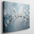 Framed canvas print of serene cherry blossoms with impasto texture on blue background