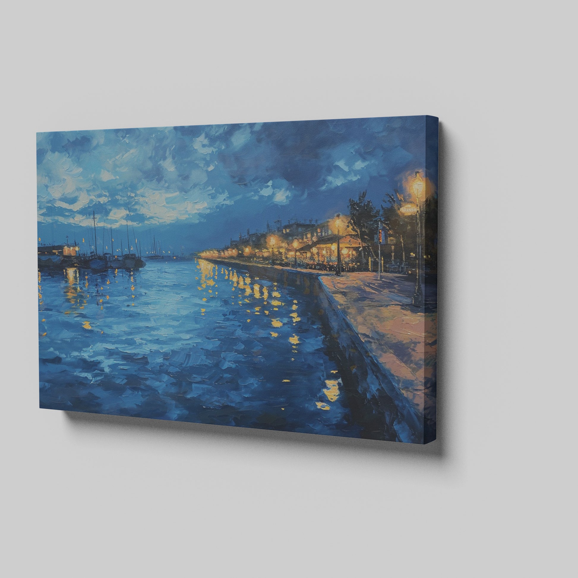 Framed canvas print of twilight seascape with vivid blue waters and illuminated harbour lights