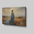 Framed canvas print of an elegant lady in a blue dress against a rural sunset backdrop with warm hues and a dramatic skyline